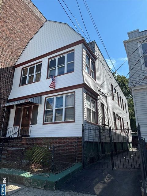 Photo of 108 Rutgers Avenue, Jersey City, NJ 07305 (MLS # 25033242)
