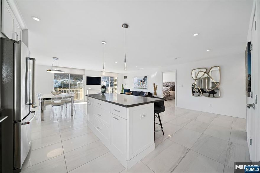 Spacious and private 1BR/1.5BA CORNER UNIT at Admiralâ€™s Walk offering 1,060 SQFT of bright, quiet living space. This beautifully renovated home features floor-to-ceiling windows, an oversized balcony accessible from both the living room and bedroom, and a modern kitchen with stainless steel appliances and a RIVER VIEW. Enjoy the convenience of a Miele washer/dryer, custom walk-in closet, and a spa-like bath with soaking tub and an updated shower. Rent includes free outdoor parking, Wi-Fi, and full cable with premium channels (MAX, Showtime, Cinemax, Paramount+). Residents enjoy 24/7 concierge, river-view gym, pool, tennis, basketball, pickleball, party room, and year-round community events. LOCATED DIRECTLY IN FRONT OF THE EDGEWATER FERRY TERMINAL â€”commuting to NYC is effortless. Just minutes to shopping, dining, and entertainment.