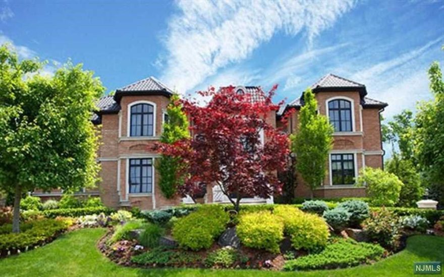 12,300 sqft of CUSTOM LUXURY LIVING! Grand Marble Foyer, formal Liv & Din Rms, Theater, Office for 3 & Billiard Rm. 2 Gourmet Kitchens perfect for a Professional Chef, with 2 Wolf Stoves-10 burners & 5 Ovens, 2 dishwashers, 2 islands, Subzero Pro Series Refrigerator, Miele Espresso station, custom cabinetry & breakfast area & Family Rm w/ precast wood burning frpl w/auto gas starter & wall of custom French doors to the back patio. 2nd LL: Mstr Suite is an understatement, precast frpl, Juliet balconies, 2 lg walk-in closets, his & her bath w/steam shower & sitting rm. 4 Bedrm Suites w/ marble baths, Jacuzzi's & walk-in closets. LL: Family rm, Bedrm, 2 Baths & gym area. 5 Car heat/AC Gar w/ Ceramic Tile, Hardwood & Radiant floors throughout. Saltwater Pool lined w/Italian granite specs & Jacuzzi. Stunning grounds, Generator, Sec cameras system, 2 Laundry Rms, Brick exterior, Caribbean style roof & gutters, Gated Circular Driveway, Low Taxes & Mins to the GW-Bridge to Manhattan!