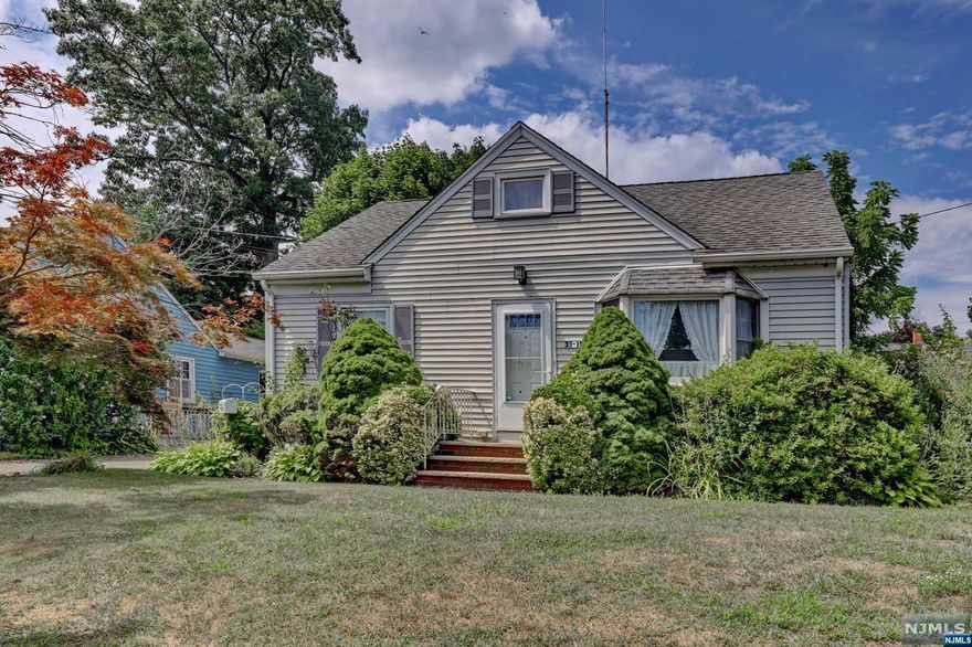 Charming Cape Cod Style Home in a highly sought-after neighborhood, just 3 houses from Milnes School and Thomas Jefferson Middle School. Perfect for commuters, with the 164 bus to NYC only 2 short blocks away. The first floor boasts hardwood flooring throughout, a living room, a kitchen, a spacious dining room/den addition, a full bathroom, and two bedrooms. The second floor offers a large bedroom as well as storage. The full basement has an additional bathroom, providing extra living space or storage. Outside, you'll find a double driveway for convenient parking, a large deck with a handicap accessible ramp, and a shed. Enjoy the peace and privacy of a secluded backyard. Gas forced hot air heating and central air conditioning ensure year-round comfort. This home is brimming with potential and ready for your personal touch. Don't miss out on this fantastic opportunity to own a piece of this desirable community!