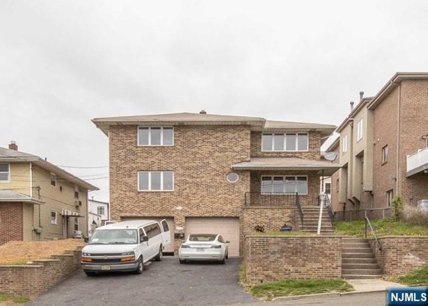 COMPLETELY RENOVATED second floor unit of a top/bottom two-family home in a prime location of Palisades Park. Flawlessly updated three bedroom and two bathroom unit features brand new kitchen, flooring, and painting. All rooms are generous in size suitable for all ages along with the master suite having its own ensuite bathroom. Laundry in unit for ultimate convenience along with central air and two tandem parking. Location offers close proximity to local highways, restaurants, shopping, NYC transportation and more. ***The unit will be refinished after the current tenant moves out***.