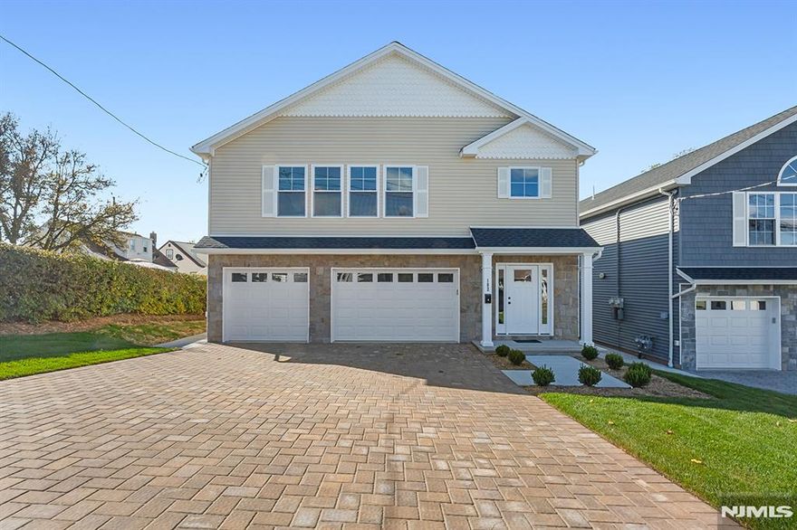 OPEN HOUSE FOR 12/7 IS CANCELED. NEW CONSTRUCTION ON NEW FOUNDATION!! Escape the confines of city life for suburban peace and quiet. Incredible, 4300+ sq. ft. 2 fam. home on a huge lot located on a great residential street, 2 blks from bus trans. to NYC and 15min. to the GW bridge, 20 min. to Newark airport. Enter the 2 story entry foyer w/4 ft. red oak staircase w/iron balusters. The OPEN flr plan w/the 13' vaulted ceiling will amaze & presents a true GREAT ROOM, (LR, FDR, KIT) measuring (33'9 x 34) or1122 sq. ft of living spc as ceiling makes it feel even larger. State of the art Kitchen w/cntr island, Shaker cabinets, quartz counters, SS appl. pkg., ballroom size FDR, all with 3/4 Red Oak Hdwd. flrs thru-out the entire main flr. MBR (19'4 x 17'2) w/MBTH w/6ft vanity w/dbl sinks; huge WIC closet. BR (14'x12') with O/S dbl clst & BR (12'x12'6) w/WI clst. Gst CT Bath w/sot. main flr topped off by huge pantry & private lndry rm. The ground level offers more space for owner with Fam. Rm. (16'9 x 19'11) w/comm. grade vinyl plnk floors & sgd. to paver patio' and a Pwdr rm. Amenities: High Eff gas HA Heat; CAC; tankless water htr; 25' x 30' paver drvwy. w/Belgium blk; 50' x 85' yd enclsd by premium 6' high vinyl privacy fence. The 1 BR ground level apartment is 800+sq.ft. w/open concept living space (LR, DA, KIT), FCTB, w/bonus extras; Lg. BR Laundry Rm. and gar. pkg. *LIFETIME Timberline roof & Bldr.10 yr. Home Warranty. HUGE YD AFFORDS POOL + Room for activities.