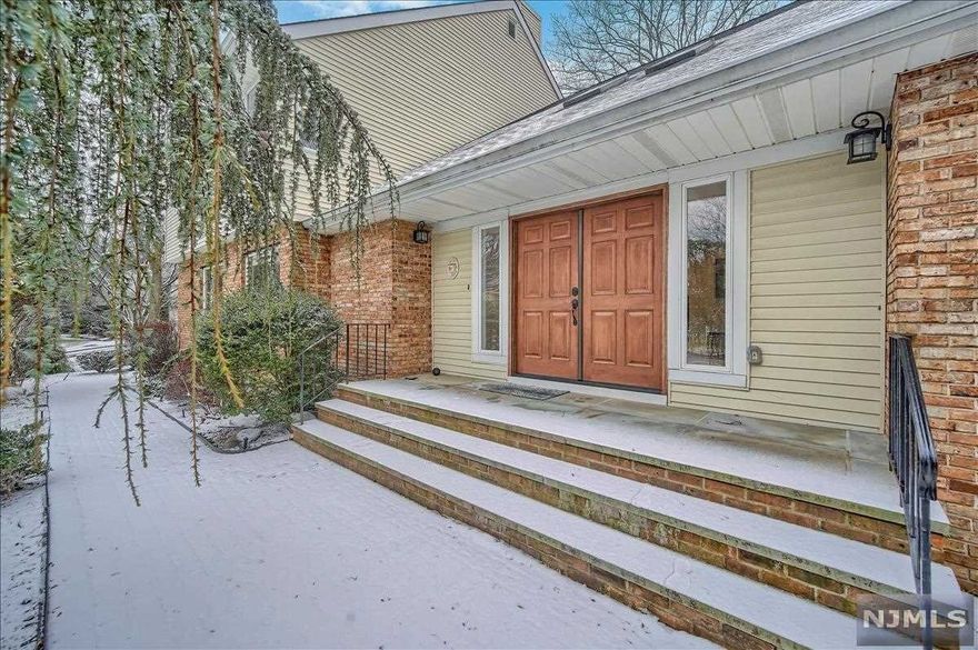 Move in ready spacious and bright 5 BR/5.5 BTH custom colonial w/over 4000 sq.ft. at the end of a Cul-De-Sac. Top-rated schools, less than 1 mile to both Allendale & Waldwick train stations, NYC bus. Great for Family Living & Entertaining! 1st level with inviting two story entry foyer; huge great room w/vaulted ceilings & FPL; FDR; gourmet kitchen with breakfast area, pantry cabinets, granite countertops, ss appliances, two dishwashers; large en-suite BR with walk-in closets; spacious laundry & 2 car garage. 2nd level features an oversized primary BR with 2 walk-in closets and large BTH; 3 additional large en-suite BRs each with walk-in closets. Finished basement with media room, pool and ping pong areas, gym, cedar closet and large additional storage space. Hardwood floors throughout the house, ample closets, 4 zones heat & central AC, HALO-LED in-duct whole house air purifier, reverse osmosis water filter, water softener, internet connected outdoor lighting and garage doors.