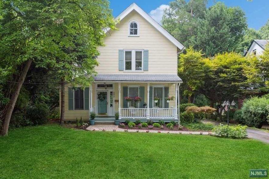 Welcome to your dream home nestled in the desirable town of Cresskill, close to town, schools & NYC transportation. Boasting 3,200 square ft w/5 bedrooms & 3 1/2 bathrooms in NO FLOOD ZONE, this residence is tailor-made for families seeking comfort & convenience. The 1st floor features a welcoming living room, dining room, laundry area, open floor plan kitchen & family room w/custom stone fireplace, perfect for cozy gatherings. Kitchen includes custom cabinetry w/tons of storage, stainless steel appliances, granite countertops & island. On 2nd floor, oversized primary bedroom w/vaulted ceilings, lots of windows overlooking the mature backyard, ensuite bathroom & WIC. Three additional bedrooms provide plenty of room for larger families or home office. Additional highlights include large, finished basement w/high ceiling, natural light & private entrance, 2 story detached garage, spacious patio, central AC, EV charger, & brand- new HVAC system. Don't miss this opportunity!