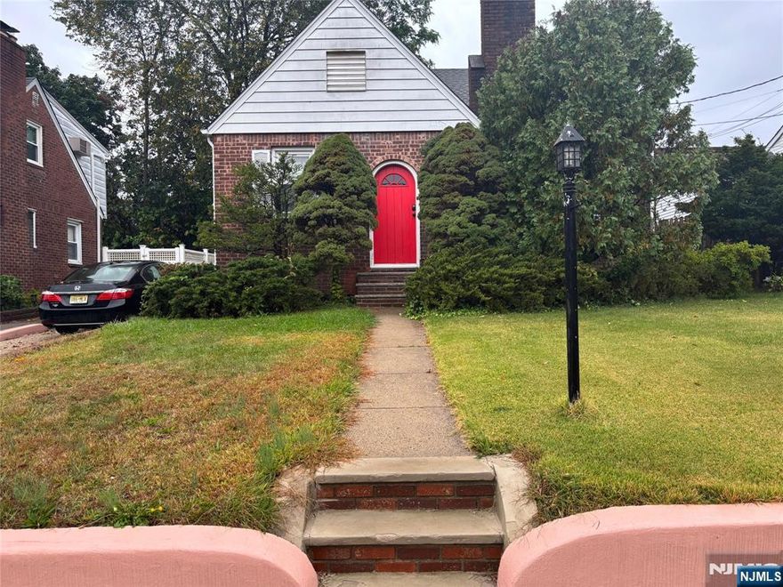 This home is truly a diamond in the rough, offering incredible space and potential for the right buyer ready to bring it back to life. Featuring four bedroomsâ€”with the possibility of a fifthâ€”this property provides flexibility for growing families, guests, or even a home office. The first floor welcomes you with a formal living room with fireplace, an eat-in kitchen, family room or dining room, perfect for everyday living and entertaining. There is also a convenient first-floor bedroom and a full bathroom, with the bedroom offering its own separate entrance to the bathâ€”ideal for privacy or guest use. Step outside to enjoy a charming porch and a spacious backyard, great for relaxing or hosting gatherings. The property also includes a one-car garage and a driveway that can accommodate up to four additional vehicles. Upstairs, youâ€™ll find three generously sized bedrooms and another full bathroom. The master bedroom stands out with its own sitting area and an oversized closet that provides access to the attic, offering even more storage or future possibilities. The basement adds extra functionality with a half bath and a bar area, creating the perfect space for entertaining or customizing to your needs. This home does need TLC, but with vision and care, it can be transformed into something truly special. Make it your own and unlock its full potential. Being sold As-Is.