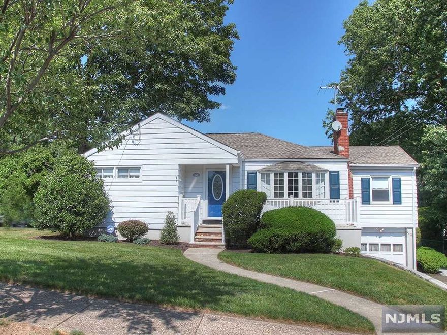 Beautiful Single Family home w/in-law suite located in the desirable Montclair Heights section of Clifton. This raised-ranch home is on a 1/3 of an acre and features 4 bedrooms, 2 full baths, LR with wood-burning fireplace, DR and Large Eat-in Kitchen w/SS appliances and oak cabinets. Also includes a lovely law-suite with EIK, 2 bedrooms, LR and full bath. Hardwood floors throughout! Full finished basement with additional 1600 sq ft of living space that features a summer kitchen, 1/2 bath, bar, laundry area and plenty of storage space. Enjoy the professionally landscaped park-like backyard which has a built-in pool, patio, BBQ, storage shed and Fenced-in yard. Attached 1 car garage with a driveway that holds 5 cars. Easy access to NYC transportation. Don't miss this one!