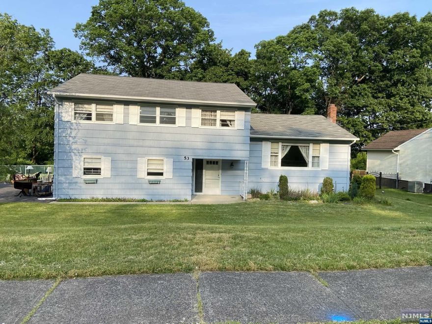 YOUR SEARCH ENDS HERE! Opportunity to update & design your dream home in a gorgeous tree-lined neighborhood. Oversized lot with fenced in backyard & patio off family room. Large entry foyer w/ spacious closet and entry to 2 car garage. Original kitchen and baths w/ 2 brand new toilets, a new vanity & 4 good sized bedrooms. Mbdr with full bath, add'l 1/2 bath off family room & full bath on 2nd fl. Wood floors, central vac, central A/C (only 3yrs old) with attic fan keeps a/c costs low. Good sized laundry room off family room for convenience with washer and dryer included. Don't let this one slip on by.