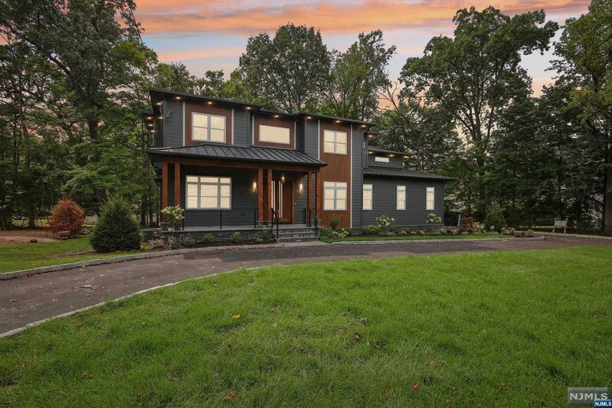 Experience unparalleled uniqueness in this new construction home, setting a new standard with its exceptional amenities. Spanning 5,296 sqft, this meticulously designed residence features a soundproof movie theater & a wine cellar. This east facing home offers 6 bedrms and 5.5 baths, including a master suite with a private balcony, his-and-hers closets, a freestanding tub, a spacious standing shower, & a double vanity. The expansive kitchen boasts quartz countertops, Viking appliances, a butler's pantry, a mudroom, & much more. As you approach, step through the custom solid mahogany door to discover a home with high ceilings, a modern hanging chandelier, and hardwood floors throughout. The stairs and ceilings feature a stunning LED design, with sensor-activated lights illuminating each step as you walk. The 2nd floor features a phenomenal layout with 4 bedrooms and 3 full bathrooms, including 2 bedrooms with their own private bathrooms and 2 bedrooms connected by a Jack&JILL.