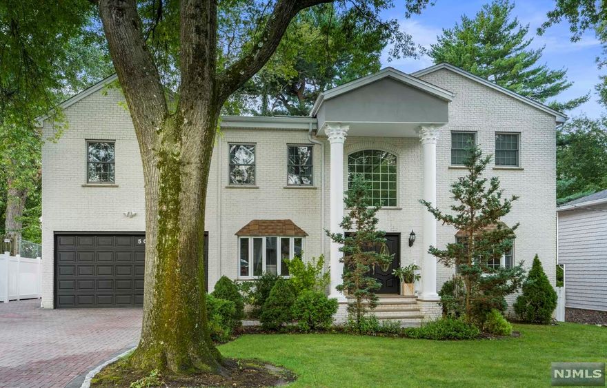 Come see this timeless colonial in the town of Paramus! Built in 2005, this Bergen County home located on a quiet tree-lined street features massive space, elegant finishes, an open layout, and so much more. With roughly 4k sq ft and an additional 1500 sq ft The 1st floor features beautiful finishes, crown molding, new paint, 10' ft ceilings, full bath, laundry, new quartz countertop and new backsplash, custom kitchen island and a built in breakfast nook! Oversized deck and large backyard for your enjoyment. 2nd fl includes 5 bedrooms, primary bedroom with balcony and 2 large WIC and a Jacuzzi! Additional bedrooms all with tall ceilings and large closet space and a guest room perfect for work from home office space or den. The full finished basement includes full bath, pantry, dry bar, office room, gym room and a movie theatre room! Perfect location! Easy access to highways and malls. Come enjoy this home perfect for entertainment and everything Paramus has to offer!
