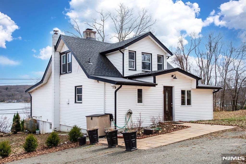 Photo of 677 Warwick Turnpike, West Milford, NJ 07421 (MLS # 26008014)