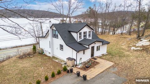 Photo of 677 Warwick Turnpike, West Milford, NJ 07421 (MLS # 26008014)