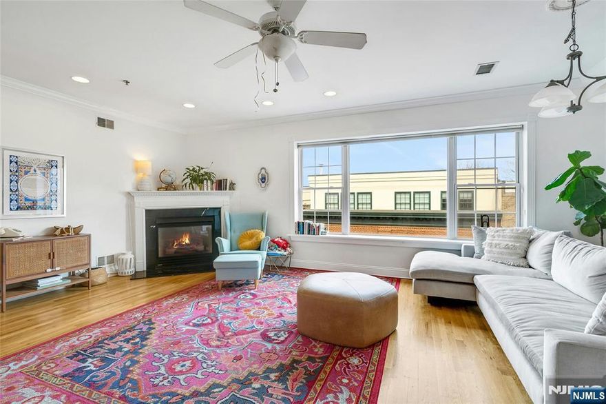 Welcome to luxury living in one of Hobokenâ€™s most coveted downtown blocksâ€”just minutes from the PATH and Ferry for a seamless NYC commute. This expansive and bright 2-bedroom, 2-bath Penthouse condominium offers 1,367 square feet of living space, deeded parking, and the convenience of an elevator buildingâ€”an exceptionally rare find in this prime location. The spacious living room is filled with natural light from oversized windows, creating an open and inviting atmosphere. The chefâ€™s kitchen features stainless steel appliances, granite countertops, a tile backsplash, breakfast bar, and ample cabinetryâ€”perfect for both everyday living and entertaining. Retreat to the oversized primary suite, complete with sunny southern exposure, a generous walk-in closet, and a private en-suite bath. Additional highlights include a gas fireplace, hardwood floors throughout, central A/C, and in-unit washer/dryer. Donâ€™t miss this rare opportunity to own a commuterâ€™s dream home with premier downtown Hoboken shopping, dining, and cafes just steps from your door.