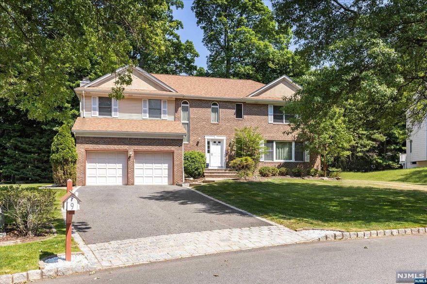 Don't miss this opportunity to move into a custom built home located on a quiet cul de sac on a generous lot. Step into the grand entrance foyer, and move your way through to the spacious living room, dining room and updated kitchen open to the sizable family room with gas fireplace. Sliding doors in the kitchen make access to the deck and backyard a breeze! Upstairs you'll find 3 large bedrooms and 1 massive primary suite featuring walk-closets & an ample 4 piece bathroom with double sinks. You'll also find your laundry room on the second floor for added convenience. Home also features a full finished basement, 2 zone AC & 5 zone heating! Exterior features manicured landscaping and lovely outdoor deck for entertaining or quiet nights at home alone. Roof is newer, being installed in the last 7 years, 6 zone sprinkler system, garage door openers, and much more! All within 1.5 miles of a charming downtown area with lots of shops and restaurants.