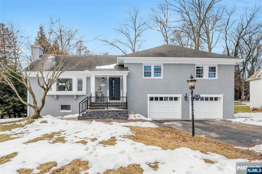 Location! Location! Beautifully renovated, move-in ready 5 BR, 4 Bath home, on a large flat lot, in the highly desirable Hamilton Avenue neighborhood of sought-after Glen Rock. Spacious, modern open-concept main level with vaulted ceilings, skylights, woodburning fireplace, built-in storage, bedroom, full bath, access to deck, and more. Well-appointed quartz and ss kitchen complete with massive island, ample gas range, additional wall oven, and built-in wine fridge. Serene primary bedroom suite with luxurious bath and custom walk-in closet. Well-designed and nicely finished ground level oasis complete with large den w/electric FPL, wet bar, built-in fridge, work/dining space, bedroom, full bath, laundry room, and outdoor access. Expansive fenced backyard with plenty of room to play and grow. Close to schools, parks, shopping, transportation, and all that the town of Glen Rock has to offer. Listing agent has an ownership interest in the property.