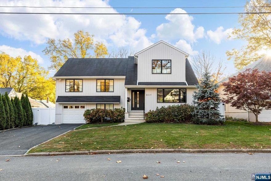 This stunning, light-filled 4 bdrm, 3.5bath split-level is fully renovated to perfection.This modern retreat boasts an open-concept design w/ spacious rooms & large windows that flood the space with natural light.The gourmet kitchen features quartz countertops & stainless steel appliances & is open to the large dining area & living room.Patio doors lead you to the outside deck & into the fenced-in yard. Relax in the spacious primary suite w/ a luxurious en-suite bath, or enjoy family time in the cozy lower-level living area. With updated bathrooms, & striking glass & chrome stair railings throughout, along with a great backyard, this move-in-ready home offers the perfect blend of comfort & style. Highlights include a security system, sprinkler system & a whole-house generator, surround sound throughout, recessed lighting & 4 zone HVAC. Conveniently located near schools, parks and shopping, this home balances modern living w/ a family friendly vibe.