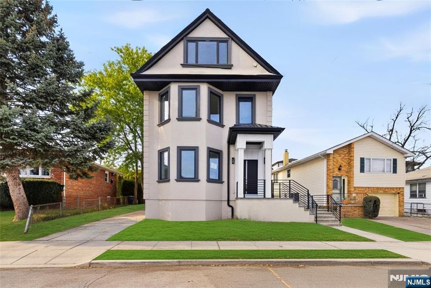 Fully Renovated 8 Bedroom and 5 Bathroom Home with In-Law Suite & Walk-Out Basement Modern Finishes Throughout. This newly renovated home offers exceptional space, versatility, and high-end finishes throughout. Featuring 8 bedrooms and 5 full bathrooms, the property is designed for flexible living with thoughtful upgrades including premium tile work, modern vanities, and quality materials across every level. The main living areas provide bright, open spaces with a large kitchen that flows directly to a private patio through sliding doors, perfect for outdoor dining and entertaining. Central air conditioning with separate systems by floor ensures year-round comfort. A standout feature is the fully finished walk-out basement, configured as an in-law or extended living suite. This level includes two bedrooms, a full kitchen with appliances, living room, and full bathroom, with direct access to the driveway ideal for guests, extended living arrangements, or additional flexibility. All kitchen appliances are included, along with a wine cooler and full basement kitchen appliances. Washer and dryer hookups are present. The driveway provides parking for multiple vehicles. Conveniently located near local shopping, restaurants, and everyday amenities, this move-in-ready home offers rare size, modern finishes, and multi-level living potential.