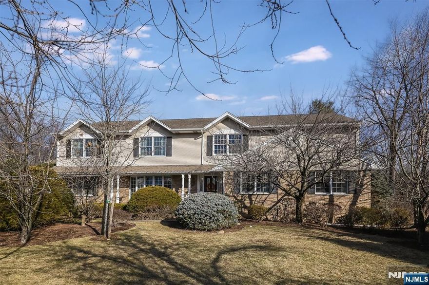 Nestled at the end of a cul-de-sac sits this 6 BR,4 bth colonial home!Stunning 2-story EF opens to gorgeous EIK w/lrge CI w/seating,quartz counters,& high-end SS appls.SGD opens to private paver patio & resort-like property w/luxurious heated Gunite pool.Kitchen overlooks spacious FR.FDR,LR,2 BRs,both w/adjacent bths work well for guests/offices,mudrm w/custom built-ins,laund rm w/ext door to patio & pool & int access to 2-car garage.On 2nd level -4 BRs + office(or 5th BR!).Primary bth w/oversized shower & free-standing tub.Hall bth w/shower over tub + sep shower,dbl sink vanity + extra built in station.Beautifully updated,5,000 SF home w/addtl finished lower level w/rec rm w/wet bar,bonus rm,storage & 2nd entry to garage.Multi-zone heat & a/c,whole house generator,central vac,chandelier lift & gleaming HW floors are just some of the upgraded features.Experience all that Glen Rock has to offer w/top-rated schools,best NYC commute,& charming downtown dining & shopping!