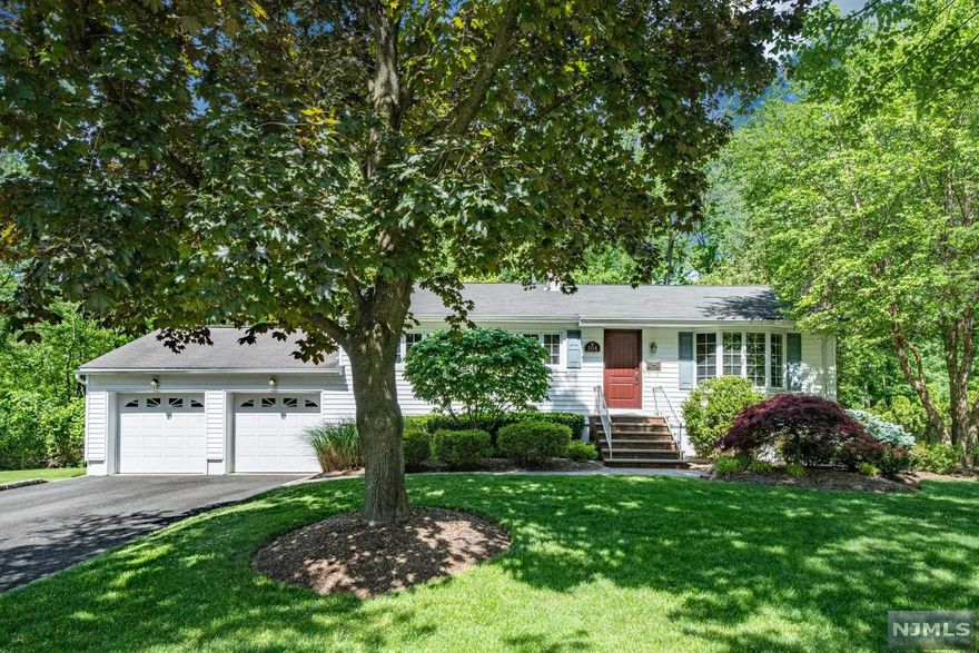 Beautifully maintained and renovated RANCH featuring 3 bedrooms and 2 bathrooms. Sitting on a quiet, dead end street, this home is completely move-in-ready. Brick wall fireplace greets you upon entry into the Formal Living Room. Continue along to the Dining Room and Kitchen with gorgeous two-tone cabinetry, SS appliances, and quartz countertops. Family Room addition surrounded by windows leads you out to the fabulous trex-deck. The basement is fully finished and hosts the 2nd bathroom. Very large basement with plenty of storage and with multiple rooms that can be used as home office, play room, gym, etc. 2 car garage, central air, and FULL HOUSE BACK UP GENERATOR! Absolutely private and quiet backyard with grassy flat yard that is surrounded by mature trees. LOW TAX! Don't miss this one!