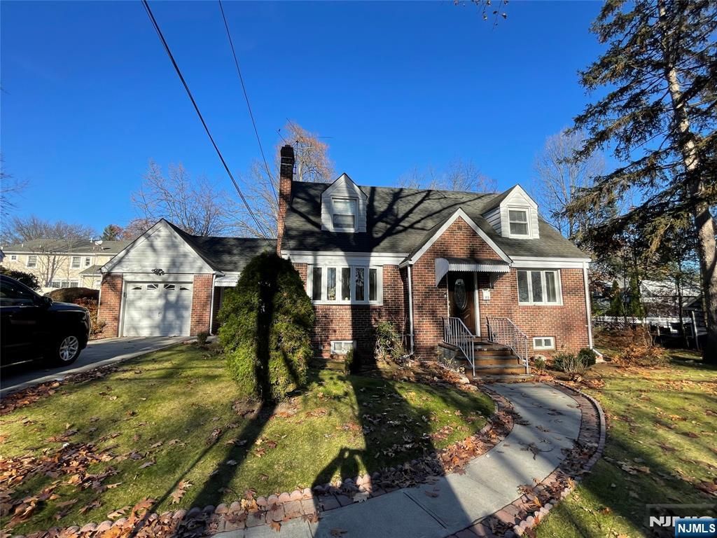 Photo of 113 E Cedar Lane, Teaneck, NJ 07666 (MLS # 25040849)