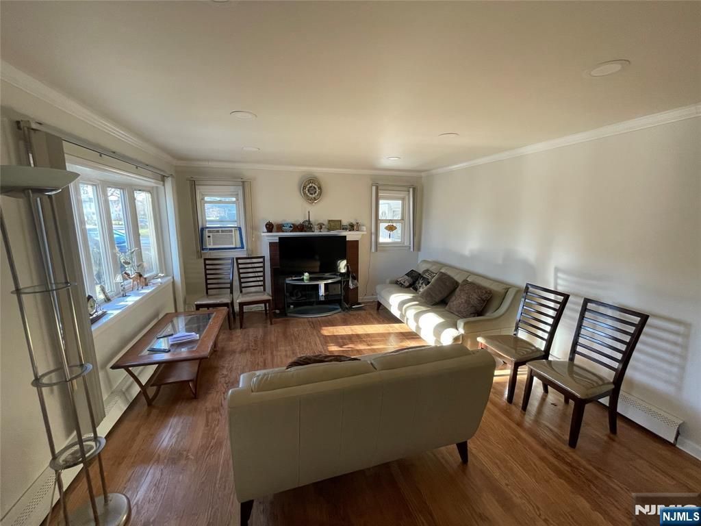 Photo of 113 E Cedar Lane, Teaneck, NJ 07666 (MLS # 25040849)