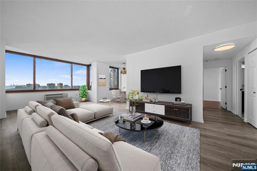 Experience luxury living at The Palisades, a prestigious high-rise building offering top-tier amenities. This stunning east-south-facing 2-bedroom, 2.5-bath condo has been meticulously renovated, providing unmatched privacy and unobstructed panoramic views of the NYC skyline and Hudson River from every room. The unit includes two garage parking spots, along with water and hot water. Residents enjoy 24-hour doorman service, concierge assistance, a state-of-the-art fitness center, an outdoor pool with a BBQ area, and the convenience of on-site management. This exclusive unit ensures the pinnacle of luxury living, just moments away from NYC transit, major highways, dining, shopping, theaters, and top-rated schools. Seize the opportunity to make this unparalleled retreat your own!