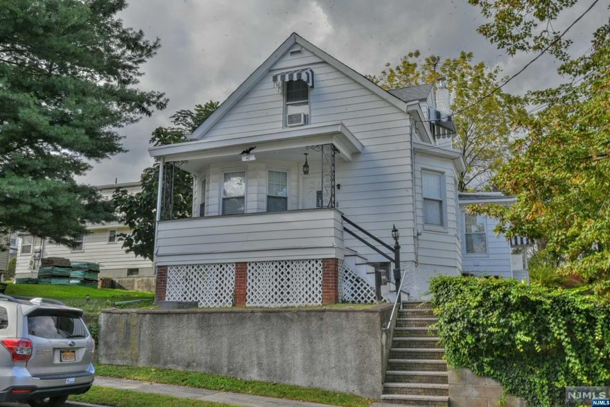 Welcome to this charming 2-family home located in Hawthorne! Located near parks and schools, this home is sure to please. The recently renovated first floor features a living room, dining area, bedroom, updated eat-in kitchen and updated full bath. The first floor also features a front porch with great NYC views, interior access to the basement and new laundry hook-ups just off of the kitchen. The second floor has its own private entrance and features an eat-in kitchen, living room, large bedroom, and full bath. Other features include a large private yard, newer furnace and hot water heater, and plenty of street parking. This 2 bedroom, 2 bathroom home is perfect for a first time buyer or investor looking to collect additional income - perfectly priced, come see this 2-family home today! HIGHEST AND BEST OFFERS DUE BY 5PM TUESDAY 10/17!