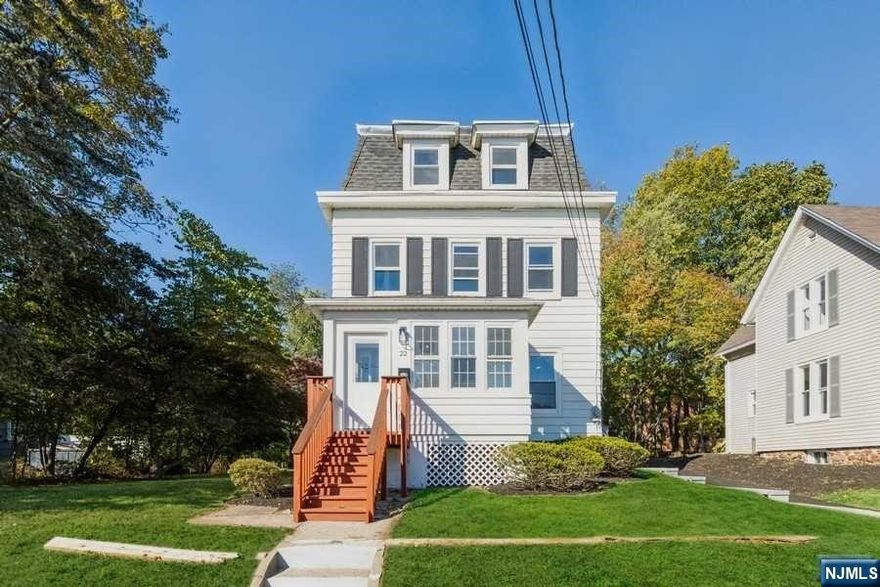 Beautifully renovated 3BR, 2.1 FB Colonial home located in close proximity to the town of Hillsdale. Inviting sunroom with windows all around leads you to large living room with beautifully refinished hardwood floors. First level boasts a large LR with plenty of windows, eat-in kitchen with quartz countertops, center island and stainless steel appliances. The kitchen has spacious dining area w/sliders to screened in deck and yard! Updated powder room completes this level. Second level boasts two large bedrooms w/ nice closet space, beautifully updated hall bathroom and convenient laundry room on this level. Third floor has a huge master bedroom suite with lovely bath and plenty of closet space. The lower level has a finished rec room, houses utilities and plenty of storage space. The home has a one-car detached garage and very spacious yard! All hardwood floors throughout, brand new heating and cooling systems, all brand new windows, recessed lighting and so much more!