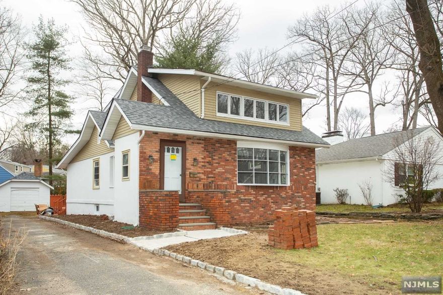 Fully gutted, renovated and modernly designed colonial home in a premiere location of Closter. All new flooring, painting, custom eat-in kitchen, elegant bathrooms and more at your disposal. Extra family room on the first floor leads out to the generous sized deck and backyard perfect for family and social gatherings. Master bedroom and master bath are conveniently located on the first floor for convenience. Both bedrooms on the second floor are ample in size with one bedroom having an immense walk in closet. Full and finished basement is also offered along with the laundry. Taxes are more than reasonable and nothing to do regarding the house except move in. Great location in a beautiful neighborhood close to the new Closter Plaza, NYC transportation, parks, places of worship and more! ** Highest and Best due by Friday (4/22) **