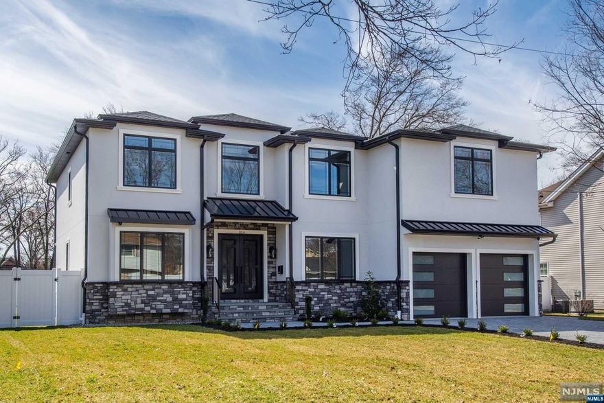 Welcome to this newly constructed colonial nestled in a highly sought-after neighborhood! This stunning residence boasts 5 bedrooms and 5.5 bathrooms.An open concept design highlighted by a large center island in the kitchen, equipped w/ JennAir appliances and a convenient wet bar for entertaining guests.The first floor in-law suite provides privacy and comfort for guests or extended family members. Discover four additional bedrooms, including the primary suite adorned with his and hers custom walk-in closets. The primary bathroom is a true oasis, featuring a luxurious full bath complete with a soaking tub, walk-in shower, and heated tile floors, perfect for unwinding after a long day. Movie theater room, sure to impress friends and family alike!This home offers many additional features including a 6 camera security system, central vac and sprinkler system. Electrical and gas already installed for a generator.Don't miss your chance to own this exceptional property!