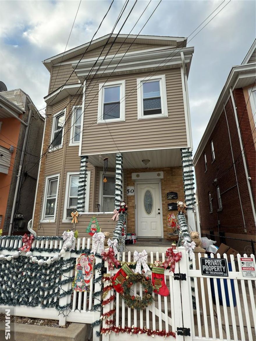 Beautiful Home in a great desired area of Passaic. Owner occupied for over a decade and well taken care of home. First floor has a Living Room, Dinning Room, Kitchen and two great size bedrooms. Second floor has the same inviting lay out as the first floor, but it also consist of two extra large rooms and a second bathroom. Both floors receive Sun light from the living room windows which give the home a warm welcoming. This Home has beautiful upgrades and great size rooms, Finished attic and basement. Convenient home for a first time buyer with great potential for rental income or for an investor looking to rent and own. This home won't stay in the market for long, Come see it for yourself! First Open House 1/18 & 1/19 from 1 - 2:30 pm