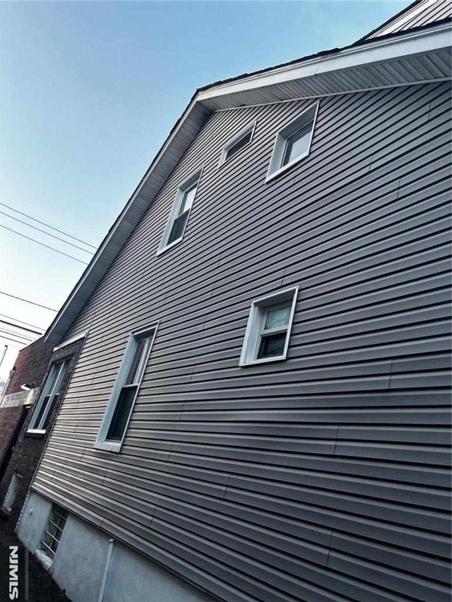 Second Floor 1 bedroom Apt , living room, modern kitchen with eating area, full bath.