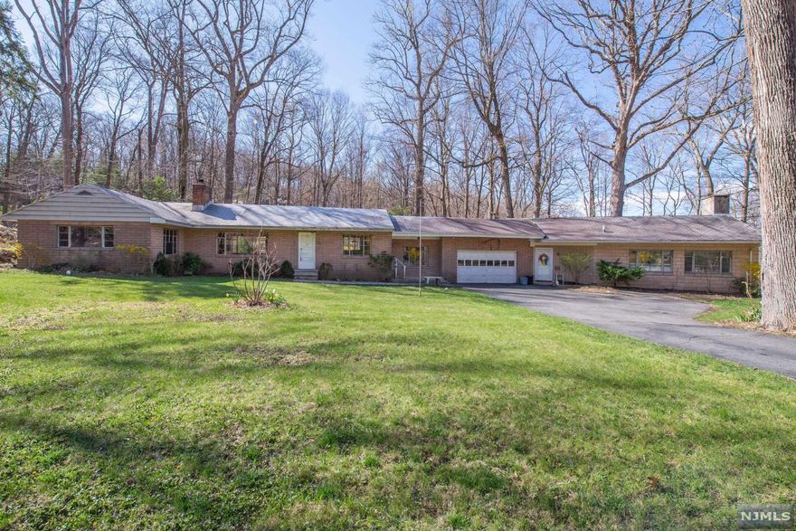 Checks Off All The Boxes! Hard to find Ranch, Expanded Family and Located in a Great Neighborhood, Lake Valhalla. Wonderful opportunity to renovate this 2,189 sq foot home with 1.16 acres of land! Enjoy the natural setting of this area while being close to shopping, great restaurants, schools and public transportation.