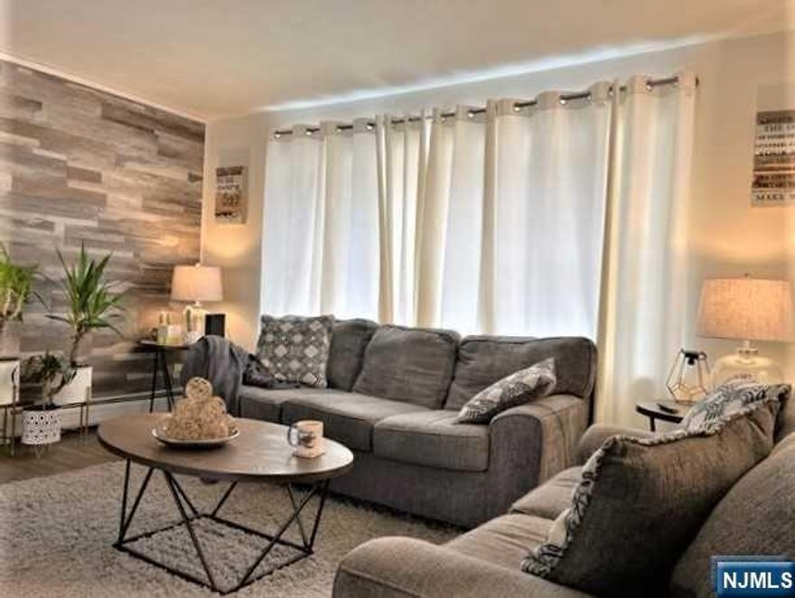 This beautifully renovated 3 Bed 2 bath Bi-level is a true gem. Completely renovated in 2022 this home offers a perfect blend of modern elegance & comfortable living. The stunning upgrades include a brand-new Kitchen 2 fully renovated bathrooms, refinished hardwood floors. Prepare to be wowed by the brand-new kitchen, featuring stylish cabinetry & quartz countertops. Whether you're hosting dinner parties or enjoying a quiet meal, the kitchen effortlessly combines functionality & aesthetics. The lower level offers incredible versatility. It boasts a spacious family room, den perfect for a home office or study & an additional room & full bath for added convenience. Whether you need a dedicated workspace or a cozy spot to unwind this lower level has it all. No expense was spared in the renovation process. The home features a new septic & furnace, providing you with peace of mind and optimal performance. Schedule a showing today and make this meticulously renovated home your own!