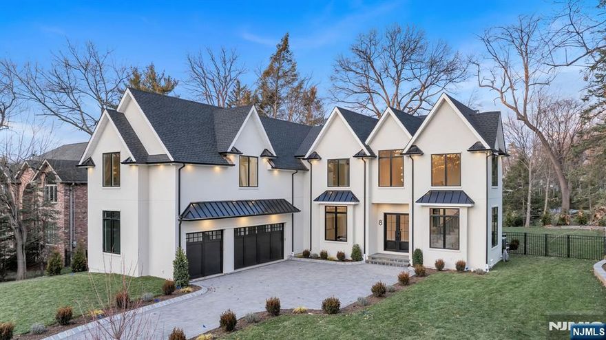 Discover modern luxury in this stunning,custom-built Colonial,situated on the highly sought-after East Hill of Closter.Thoughtfully designed with exceptional craftsmanship,this brand-new home offers 6 bedrooms,6.5 baths and a range of high-end features.Every bedroom on the 1st and 2nd floors is designed as a private suite.The interiors are finished with custom modern touches,complemented by beautiful oak hardwood floors on the 1st and 2nd levels.10 ft ceilings elevate the main floor,while the living room and entry foyer boast soaring 2 story ceilings,creating a sense of grandeur.The 2nd floor offers 9ft ceilings with additional height in the primary.Radiant heat enhances every full bathroom & mudroom.The heart of the home lies in the open-concept family room and kitchen,where sliding doors lead to a covered back patio.The lower level is designed to offer flexibility,featuring a bedroom,bathroom,rec room as well an optional theatre/gym.A spacious 3 car garage completes this property