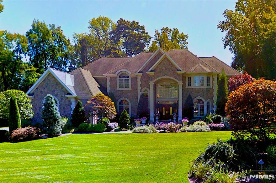 Set within one of Franklin Lakes most prestigious neighborhoods, this exquisite stone manor is a statement of timeless elegance and resort-style living. Sited on a great property it offers extraordinary outdoor entertaining space featuring pool with 5 waterfalls, spa and outdoor kitchen, capturing the culture and lifestyle of this distinguished residence. An inviting interior begins with a 2 story entry foyer, with sweeping curved staircase, custom Italian tile floor flowing into an impressive family room with extensive custom millwork, fireplace, corner wet bar and French doors opening to the patio and grounds beyond. The chefâ€™s kitchen is truly the heart of the home, offering a substantial center island, abundant custom cabinetry, and separate breakfast area enhanced by hand-painted murals. The main level also features a spacious formal dining room, elegant living room, laundry, office, and 1st floor bedroom with full bath. An additional first floor kitchen provides flexibility for entertaining, kosher use, or a thoughtfully designed first-floor in-law suite. Second level reveals a luxurious primary suite wing, complete with fireplace, sitting room, 2 walk-in closets, and spa-like bathroom. 3 additional en-suite bedrooms complete this level. An Entertainerâ€™s dream basement offers a recreation room, mahogany bar, 3rd kitchen, gym with sauna, bedroom 6, full bath, and storage. A truly exceptional home offering sophistication, scale, and unmatched lifestyle in Franklin Lak