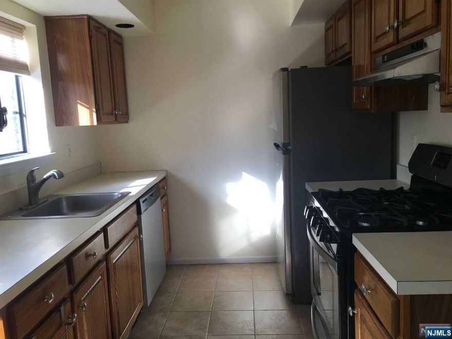 Great 2 bedroom, 2 full bath in desirable Ridge Gardens, this unit includes a garage and a private storage room. Plenty of outside parking as well. Cozy fireplace in living room, washer/dryer in the unit. Tenant responsible for first $150.00 of each repair. Tenants must submit an NTN report, proof of income, interview required. Tenant must purchase tenant insurance.