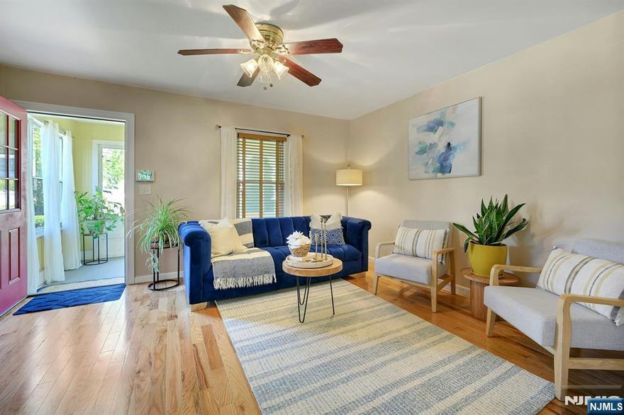 A rare opportunity in Montclair offering flexibility, space, and a layout that truly adapts to how you live. This light-filled 3-bedroom, 2-bath home is designed for both immediate comfort and long-term ease. The first floor features two bedrooms and a full bath, creating a flexible living arrangement ideal for guests, work-from-home needs, or single-level living when desired. Upstairs, a spacious primary suite offers a private retreat, complete with an en-suite bath and walk-in closets, providing separation and comfort that's not often found at this price point. The main living spaces are warm and inviting, with hardwood floors, generous natural light, and a sunroom that extends your living area in a way that feels both easy and intentional, perfect for morning coffee, reading, or quiet conversation. Set on a generous 53x125 lot, the backyard offers room to relax, gather, and grow into over time. A large waterproof garage adds meaningful utility, whether for storage, hobbies, or additional workspace. Well-maintained and move-in ready, this home offers the opportunity to settle in now while creating your own vision over time. Positioned in Montclair's South End, close to parks, local favorites, and NYC access, this is a home that meets you where you are and gives you room to evolve.