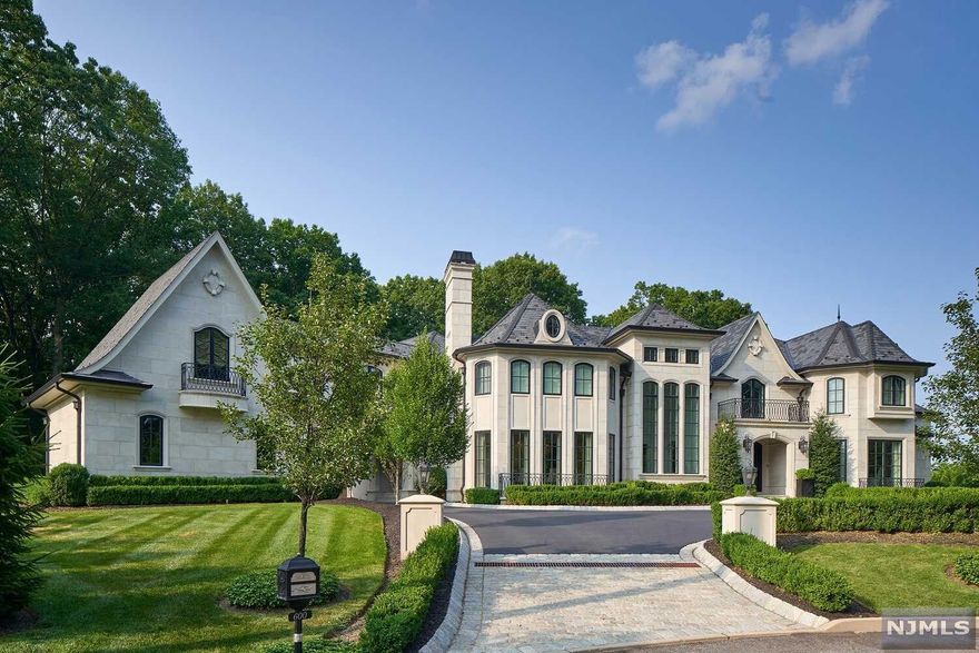 WITH MOUNTAIN VIEWS,THIS STUNNING 7100 SQ FT FRENCH MANOR,ON NEARLY 1 ACRE, SITS ATOP ONE OF THE HIGHEST POINTS IN SOUGHT AFTER RIVER VALE,FEATURING 5 BEDROOMS W/ 4.2 BATHS OF PURE LUXURY.ENTER THE 2 STORY FOYER W/GRAND STAIRCASE SURROUNDED BY A GOURMET KITCHEN W/BUTLER'S PANTRY,2 STORY GREAT RM W/FP,FORMAL LIVING RM,BAR FOR ENTERTAINING,BEAUTIFUL STUDY,BREATHTAKING LIBRARY W/FP,MUSIC RM,& FORMAL DINING RM W/FP.ASCEND THE GRAND STAIRCASE W/CUSTOM RAILINGS TO THE 2ND FL WHERE YOU WILL BE AWED BY THE VIEWS OVERLOOKING THE GREAT RM.2ND FL FEATURES 2 ENSUITES,2 LARGE BEDROOMS W/JACK & JILL GRAND BATHROOM,LAUNDRY RM,& THE LUXURIOUS MASTER SUITE W/FP WHICH INCLUDES 2 WALK-IN-CLOSETS,ELEGANT MASTER BATH W/HAND PICKED MARBLE,PRIVATE SITTING RM & BALCONY OVERLOOKING THE PARK-LIKE BACKYARD & MOUNTAINS.THIS GORGEOUS HOME ALSO OFFERS A 4 CAR HEATED GARAGE W/A PORTE COCHERE.CUSTOMIZE THE NEARLY 3500 SQ FT BASEMENT W/ 9' CEILINGS TO WHATEVER YOUR HEART DESIRES.