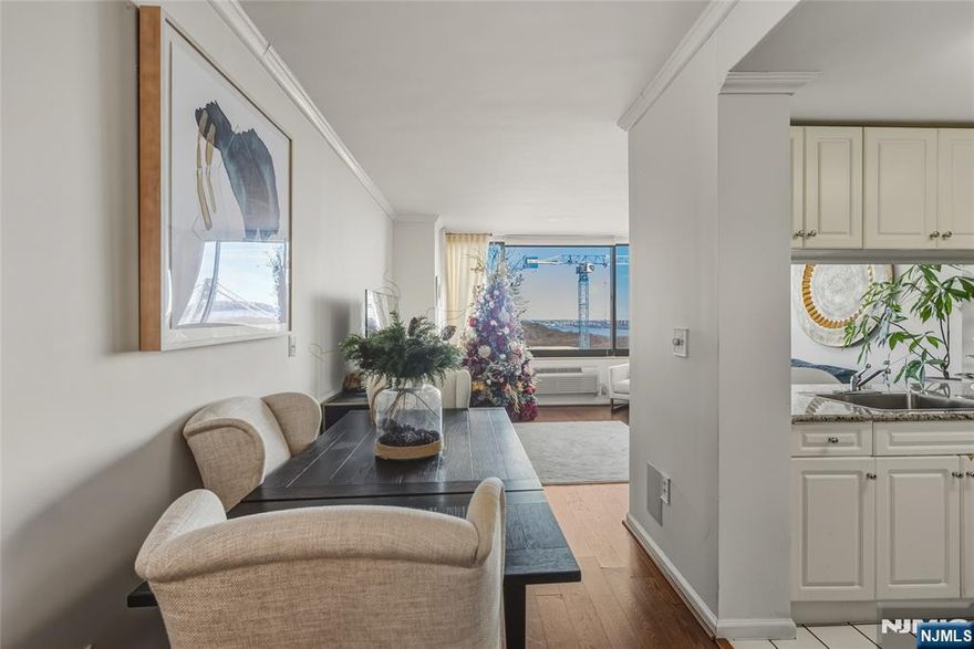 CALL LISTING AGENT WENDY GAMEZ 917-504-3347 for a private tour. Residence 3013 is a beautifully renovated 1B/1B condo located on a high floor of The Palisades, in one of Fort Leeâ€™s premier luxury buildings. This bright, modern renovated residence offers an open-concept layout that seamlessly connects the living, dining, and kitchen areas, creating an ideal setting for both daily living and entertaining. The home features newer floors and ceilings, along with a sleek, open kitchen equipped with newer appliances. Expansive windows capture stunning high-floor water and The Palisades views, providing breathtaking sunrise and abundant natural light throughout the day. An in-unit washer and dryer offer added convenience. The Palisades provides a full suite of amenities, including a fitness center, community room, library, childrenâ€™s playroom, and a beautiful outdoor pool with a private terrace and panoramic views of the New York City skyline. Additional features include 24-hour security and doorman service, visitor valet, and one deeded indoor parking space. Experience serene high-rise living with easy access to Fort Leeâ€™s vibrant downtown, dining, shopping, and all NYC transportation. The monthly HOA of $630.02 includes one deeded indoor garage parking space, hot water, and full use of all amenities, outdoor pool, fitness center, community room, library, childrenâ€™s playroom, 24-hour doorman, and valet parking. Schedule your private tour today.