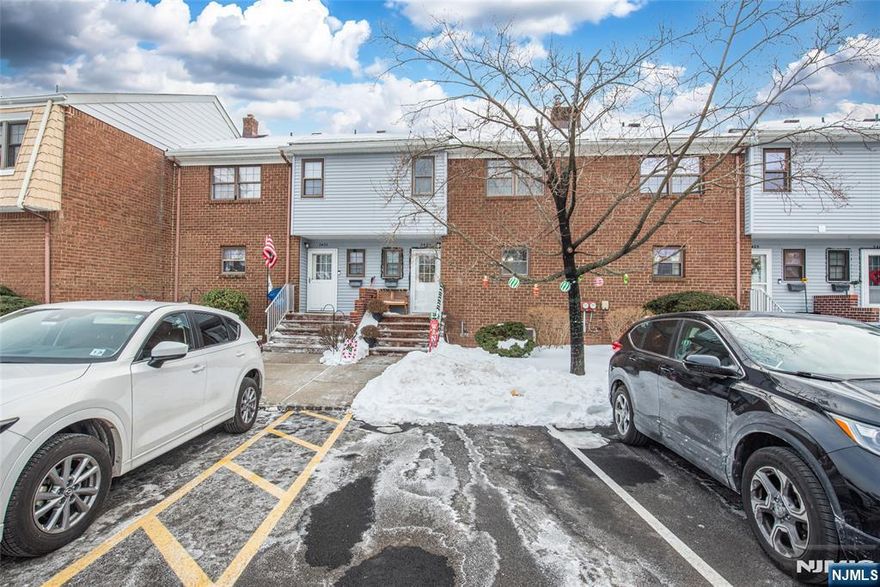 Excellent opportunity to live in the desirable Kimberwyck II community in Hillsborough, NJ! This meticulously maintained townhouse offers 2 bedrooms, 1 full bath, and 2 half baths, all updated with over 1,400 sq. ft. of comfortable living space. The main level features an open-concept living and dining area, freshly painted interiors, updated lighting, custom blinds, and a new thermostat. A sliding glass door from the living room leads to a private patio overlooking open green space, with community amenities just steps away including the pool, tennis courts, and basketball courts. The eat-in kitchen provides ample counter space, pantry storage, stainless steel microwave and stove/oven, and a newer refrigerator (less than one year old). Upstairs you'll find two generously sized bedrooms, an updated full hall bath, and an updated ensuite half bath off the primary bedroom, plus a private balcony overlooking the backyard. The full unfinished basement offers excellent potential for a recreation room, home office, or additional storage and includes a newer washer (under one year old) and a new chimney lining. One assigned parking space included. Move-in ready and truly a must-see!