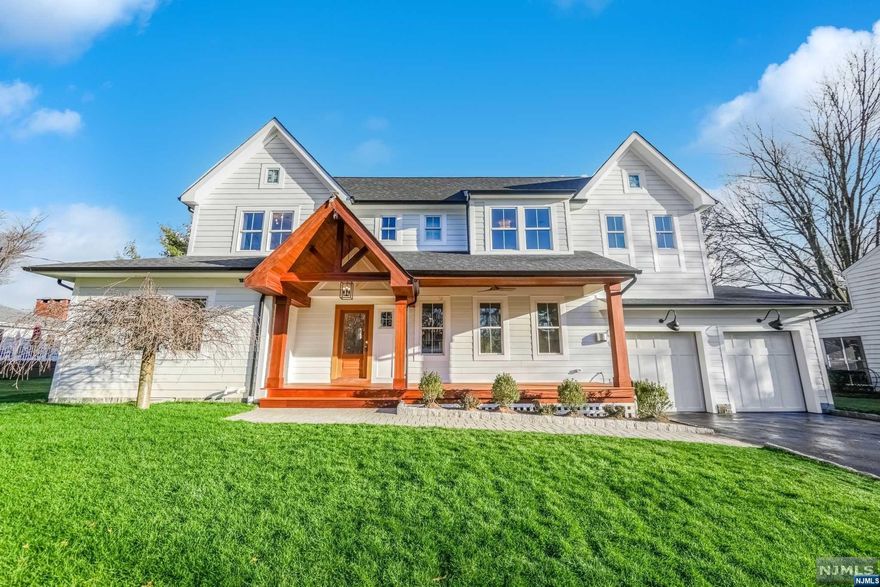 Welcome to this newly renovated 6 bedroom home in the prestigious Blauvelt section of town. This home features 14' cathedral ceilings in the kitchen, the master and 2nd floor bedroom. The open floor plan concept is a one of a kind home with custom finishes including a mahogany & cedar front porch! The main entrance features a dining room with a gas fireplace, large family room. The 1st floor features 3 bedrooms, eat in kitchen that features Quartz countertops, Stainless Steel Thermador Appliances. The second floor features Master Bedroom, The Master Bed has 15' vaulted ceilings; Basement is fully finished. House is close to schools, train, downtown and parks. House is wired for sound. This house is a must see, best in class in one of the best towns in NJ with excellent transit to NYC.