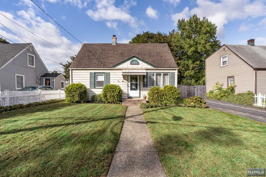 Adorable updated cape with full rear dormer, in great location! Nicely updated home. Large living room w/newly refinished wood floors, opens to updated Eat-in kitchen. 1st floor large Bedroom w/wood floors, plus office/laundry room with exit to rear yard. Second floor boasts a full rear dormer, w/two good sized bedrooms and a powder room. Fenced in rear yard with patio. Heat, central air conditioning, hot water heater and roof 10 years old. NYC bus few blocks, minutes to express NYC park and ride and minutes to Rt. 287. Close to shopping & restaurants, state parks, hiking and so much more! Please see floor plan for room sizes.