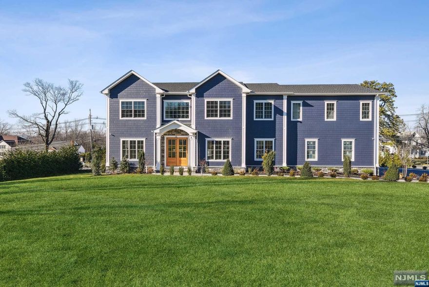 2024 Luxury New Construction by Blue Print Builders. Custom Center Hall Colonial with over 6,500sq ft of finished living space. Grand Foyer, Formal Living Room, Formal Dining Room, Butler's Pantry/Wet Bar, Family Room w/Gas Fireplace and a Beautifully designed Custom Kitchen w/high-end SS Appliance Package w/Wine Frig, Large Center Island, Eat-in Kitchen, Glass Lit Cabinetry and a Large Walk-in Pantry. Sound System, 10ft Ceilings, Mudroom, Powder Room and access to 3 Car Garage Complete 1st Floor. 2nd Fl Luxurious Primary Suite with Trayed Ceilings & Sound System, a Spa Bath w/ heated floors, soaking tub & jetted shower PLUS an enormous Walk-in closet with dressing area, bench and vanity. Four additional Guest Bedroom Ensuites, each with walk-in closets and private bath & Laundry Room w/ Folding Station and Cabinetry. Finished Walk-out Basement with Bedroom, Bath, Rec Room, Wet Bar, 2nd Laundry. Deck, Mature Landscaping, Sod.