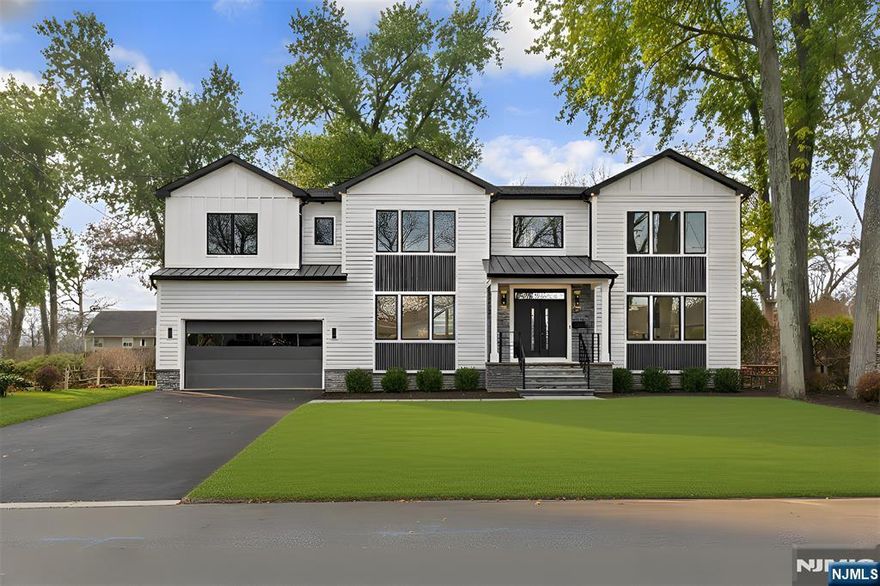 Luxury New Construction on One of Township of Washington's Most Prestigious Streets Discover modern elegance built on an existing foundation in this rare opportunity. This stunning 2025 new construction home delivers over 5,300 total sq ft of sophisticated living space, including 3,275 sq ft on the first and second floors. Step into a dramatic two-story foyer that flows seamlessly into formal living and dining rooms. The expansive great room with soaring ceilings opens to a gourmet kitchen featuring premium appliances, ample cabinetry, large center island, walk-in pantry, and adjacent guest bedroom with full bathâ€”ideal for in-laws or visitors. Upstairs, retreat to four generous bedrooms, including a junior suite and a luxurious primary suite with spa-like bath and walk-in closets. The finished basement offers a massive recreation room, direct backyard access, full bathroom, and an additional large bedroomâ€”perfect for home theater, gym, or guest suite. The house includes two car garage with large driveway enough for 6 cars. Set on an oversized lot with expansive deck, and patio for ultimate outdoor entertaining. Don't miss this exceptional blend of new luxury and prime location. Schedule your private tour today!