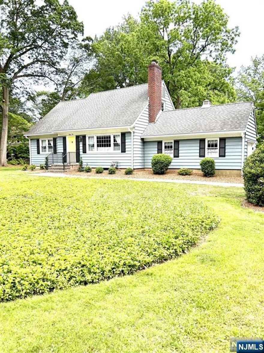 OWNER OFFERING 1ST MONTH FREE Immaculate and updated 4 bedrooms, 2 full bathrooms with hardwood floors throughout! 2 bedrooms and full bathroom on each floor. Entire home has been updated, new lighting throughout, newer bathrooms and updated kitchen. Spacious dining room with an eat in kitchen, and a 3 seasons room off of the kitchen. New Central AC system, 1 car attached garage, large clean basement with laundry and walk out to beautiful backyard. Large property with new patio. Close to all and Northern Valley School District. A Must see!