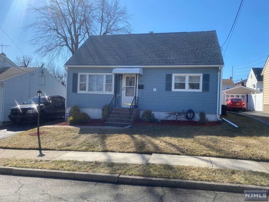 Looking for a great home with the perfect location? Look No further!! Here it is!!! This wonderful Cape Cod is looking for a new owners to LOVE!! This beauty offers Living Room, Modern Eat-in Kitchen, Entrance to Yard & Garage!!Bedroom, Bedroom & full ceramic tile bath. The second floor with a large bedroom (Master) and additional area that could be an office/nursery or computer room, Design to suit your needs. The basement is large, High & Dry with storage, Utility & Laundry but could easily be finished to include a family room!!! This charmer has ceramic & hardwood flooring plus gas heat & central air. Long driveway, one car garage & fully fenced (vinyl) in yard. Located on the East side of Town gives you a beautiful view of the NY Skyline!! Please call a realtor for a private viewing!! Closing to coincide with Seller's new purchase.