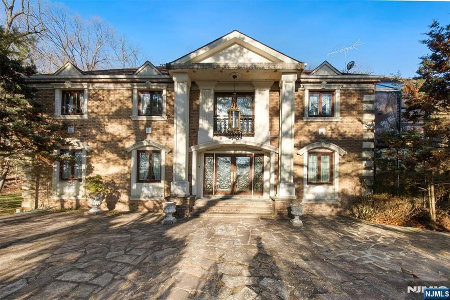 A Grand Estate Offering Scale, Privacy, and Timeless Design Set on a prestigious stretch of Saddle River Road, 12 E Saddle River Road presents a remarkable opportunity to own a residence defined by scale, craftsmanship, and thoughtful design. This expansive home features 6 bedrooms, 7 full bathrooms, and 1 half bath, offering generous space and flexibility across every level. A welcoming entry introduces a flowing layout with well-proportioned living and entertaining areas, designed to accommodate both everyday living and larger gatherings. Each bedroom is spacious and complemented by its own bathroom, providing comfort and privacy throughout the home. High ceilings, refined finishes, and abundant natural light enhance the sense of openness and sophistication. The kitchen and adjoining living spaces serve as the heart of the home, offering functionality alongside timeless style. Additional living areas throughout the residence allow for a variety of uses, from work and recreation to relaxation. Also features an in-ground pool. Situated in Saddle River, the property enjoys proximity to local amenities, parks, and neighboring Bergen County towns, while offering convenient access to major highways and regional routes for seamless travel throughout Northern New Jersey and into New York City. 12 E Saddle River Road delivers enduring elegance, generous living space, and a highly desirable location in one of Bergen Countyâ€™s most established communities.