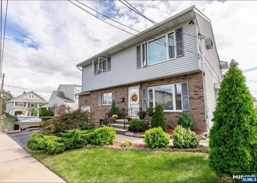 2-bedroom, 2-bath first-floor apartment with a private backyard and exclusive one-car garage. This beautifully updated unit features a spacious eat-in kitchen with stainless steel appliances and a fully finished basement that offers additional living space ideal for a family room, home office, or guest area. Conveniently located near NYC transportation, shopping, dining, and all major commuter highways, this home is move-in ready and perfectly situated for comfort and accessibility.