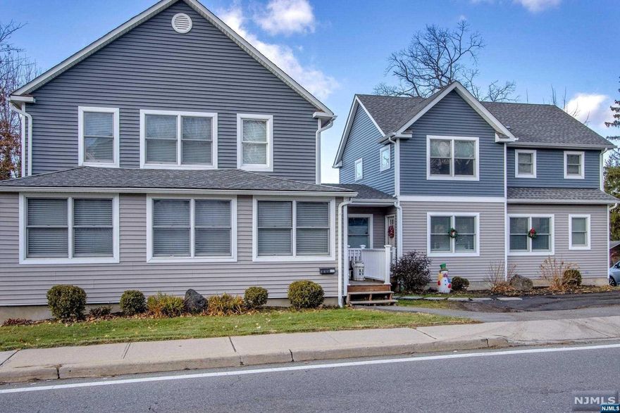 Special home, completely remodeled just 5 years ago, perfect for extended family boasting 6 Bedrooms, 3 Full Baths and 2 Half Baths. Main Home is 4 Bedrooms, 2 and Half Baths with a partially finished basement heated with a Pellet Stove. Incredible open floor, gorgeous kitchen with Quartz Counter top, stainless steel appliances and two ovens. Including every family's need of a Mud Room off the deck to catch the coats and backpacks. Primary Bedroom with En Suite and Walk In Closet. Addition is 2 Bedrooms, 1 and a Half Baths with a kitchenette. Washer/Dryer on second level makes laundry a breeze. Oversized two car garage is for so much more than one would expect with cabinets for storage and a room perfect for crafts or organizing the holiday decor. Out building makes a great storage area, or play area. Entire yard is fenced in to protect those you love. This house is so unique, it must be seen to experience all there is to offer.