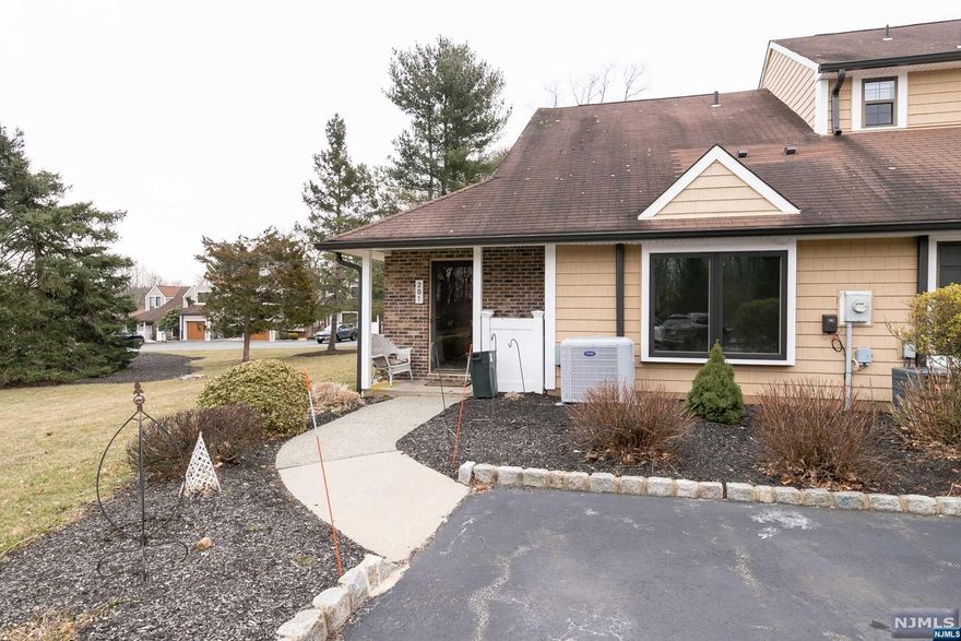 Welcome to this 2 bedroom 2 full baths end unit townhouse/ condo featuring a large skylight in the bright, beautiful sunroom. It's the perfect spot for curling up at the end of the day. The kitchen offers updated custom cream colored cabinets, granite countertops, large skylight and stainless steel appliances that will appeal to the home chef. The first floor full bath is tastefully updated. The spacious family room presents an extra large window looking into the sunroom. The main bedroom provides extra room for an office space or casual sitting room. The neutral color palette makes this home move-in ready. Conveniently access to shopping, major highways, schools and transportation. This won't last!